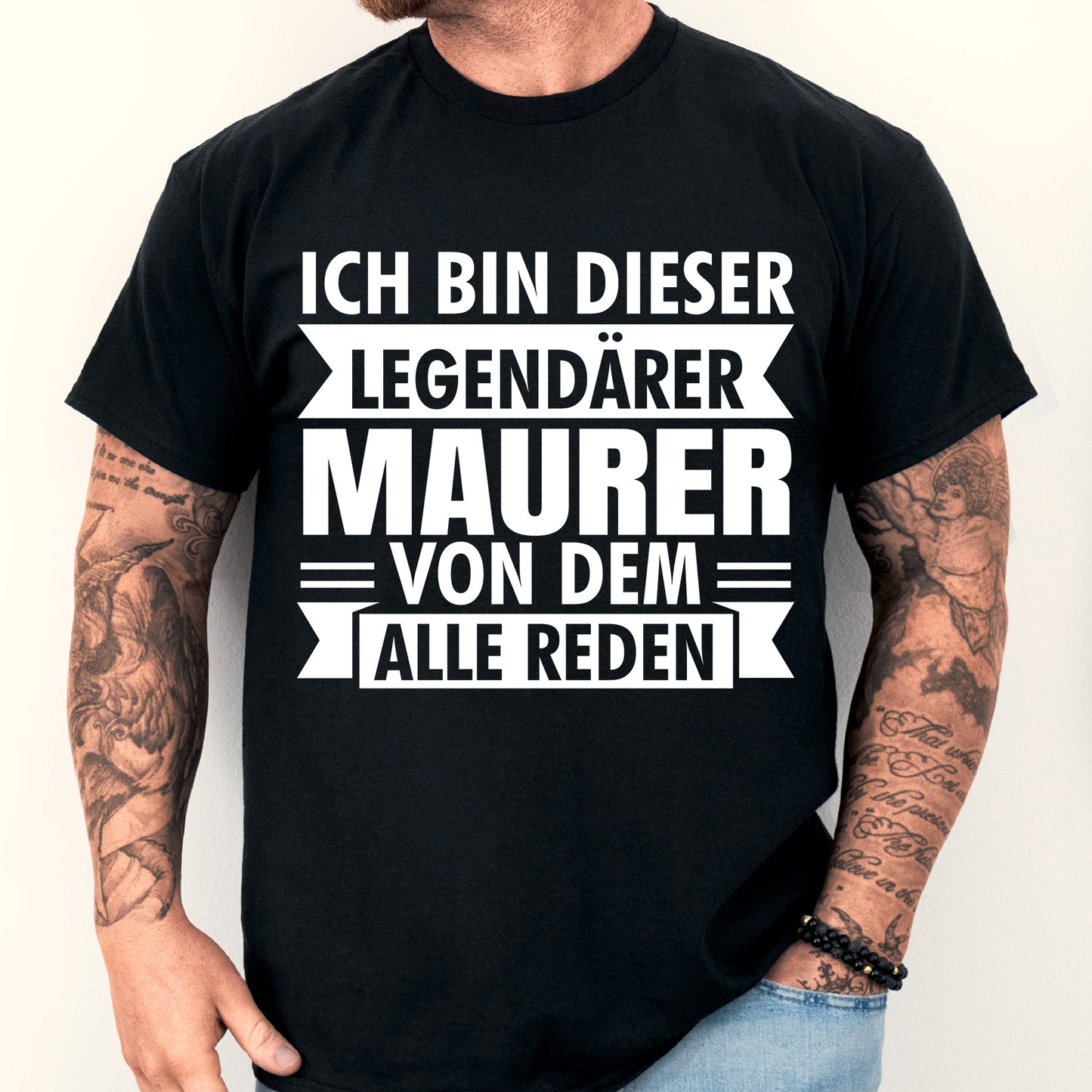 Mann trägt ein T-Shirt mit der Aufschrift "legendärer Steinmetz Geschenk Stein" und einem Maurer-Design.