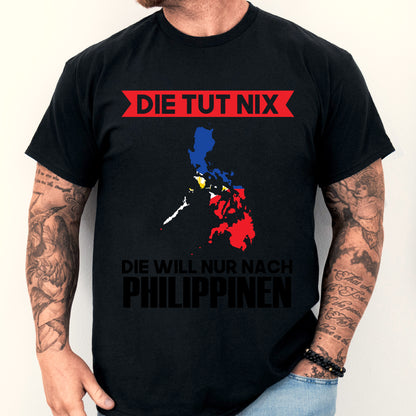 Mann trägt ein T-Shirt mit der Aufschrift "Die tut nix" und der philippinischen Flagge.