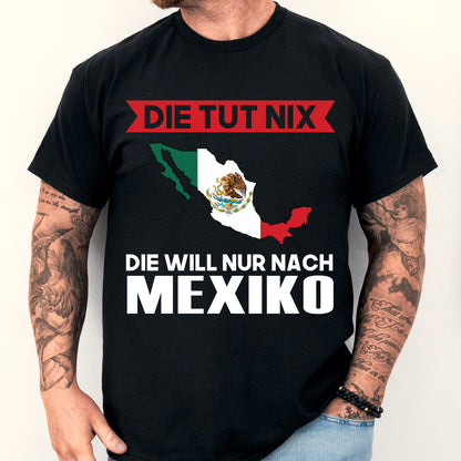 Mann trägt ein T-Shirt mit mexikanischer Flagge und dem Text "Die tut nix Geschenk".